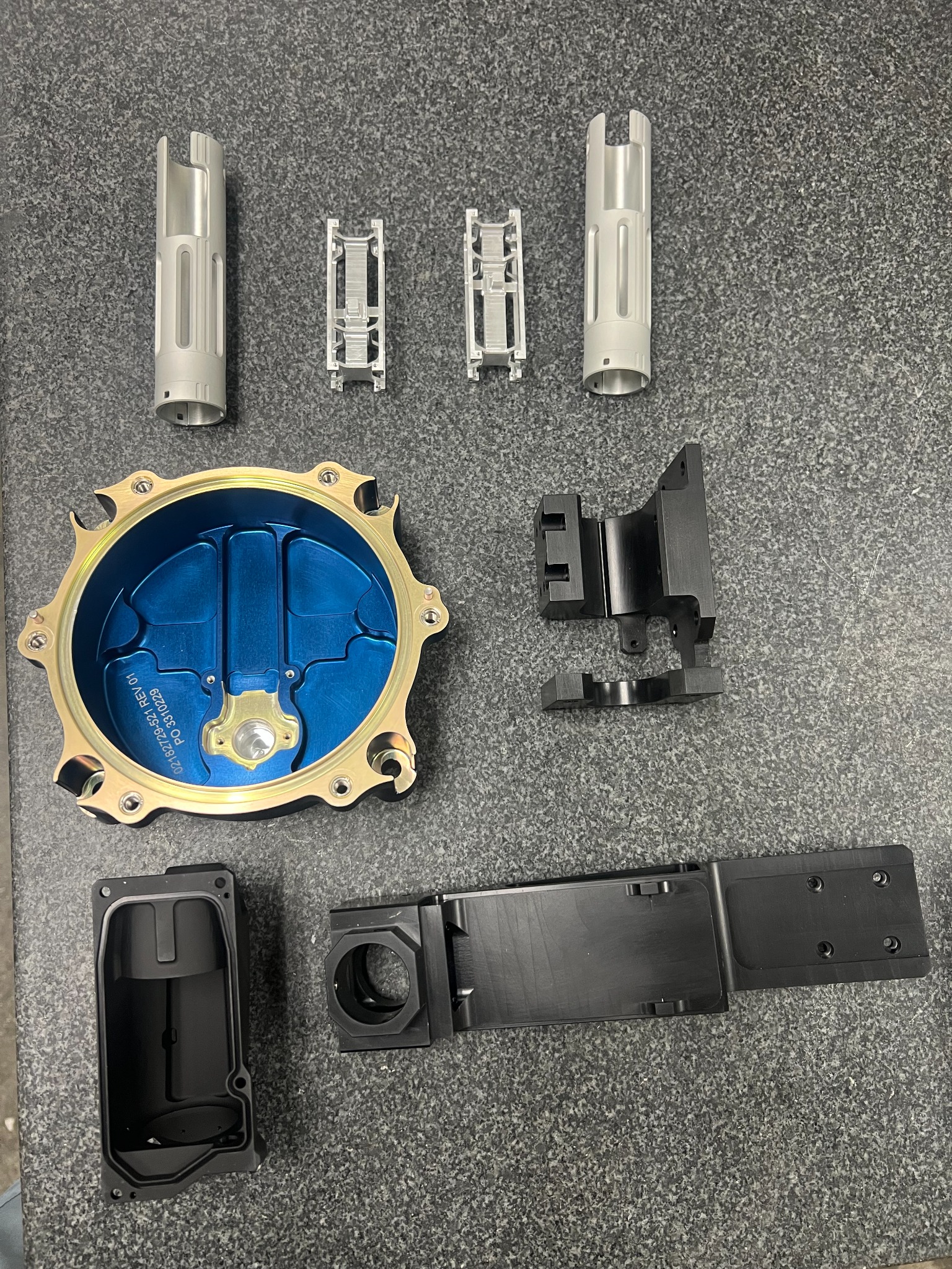 Additional set of precision machined components